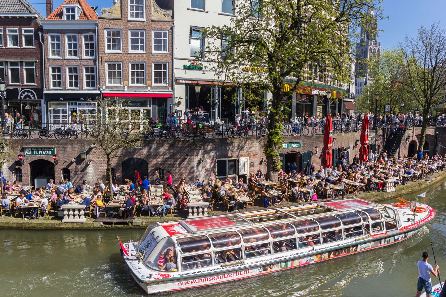 7 reasons to visit Utrecht A tourist boat on a canal lined with restaurants
