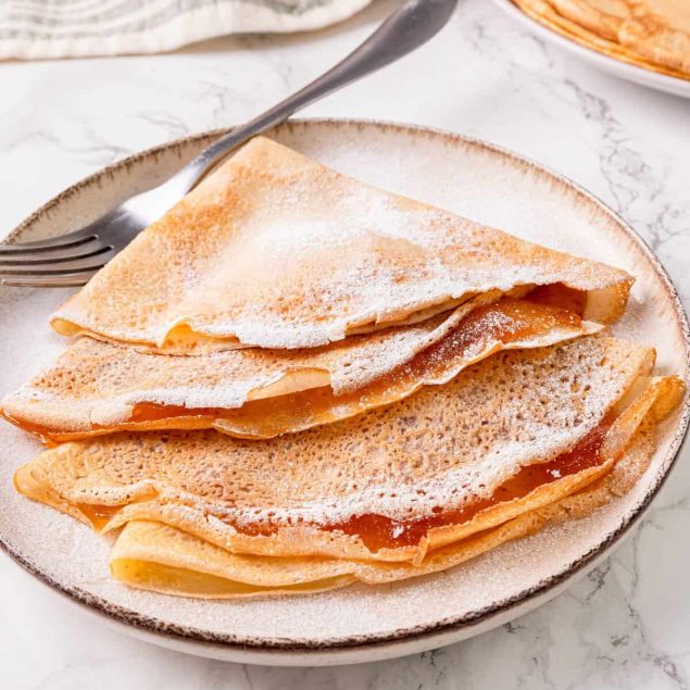 7 Tips for a Trip to Amsterdam for First Timers to The Netherlands! Two crepes in Amsterdam covered in chocolate sauce