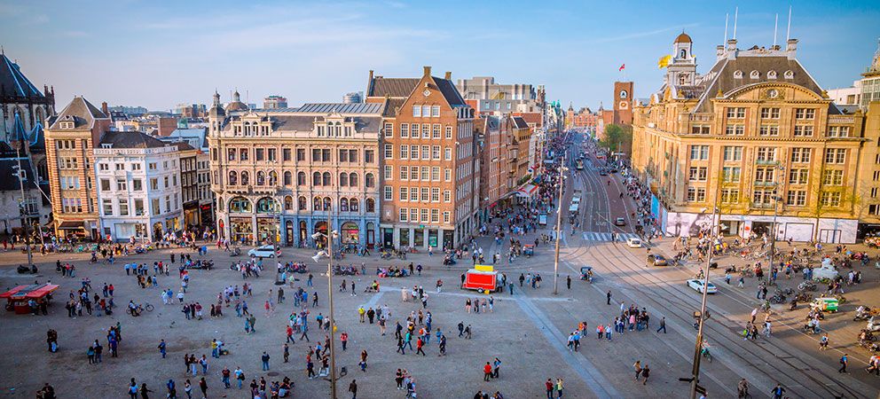 Dam Square, heart of Amsterdam. Visits in Amsterdam