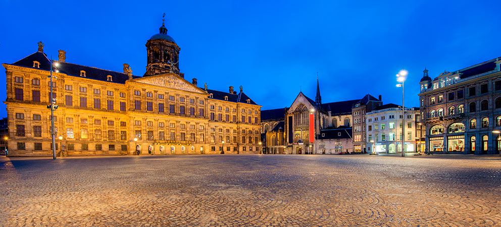 Dam Square, heart of Amsterdam. Stroll around Dam Square